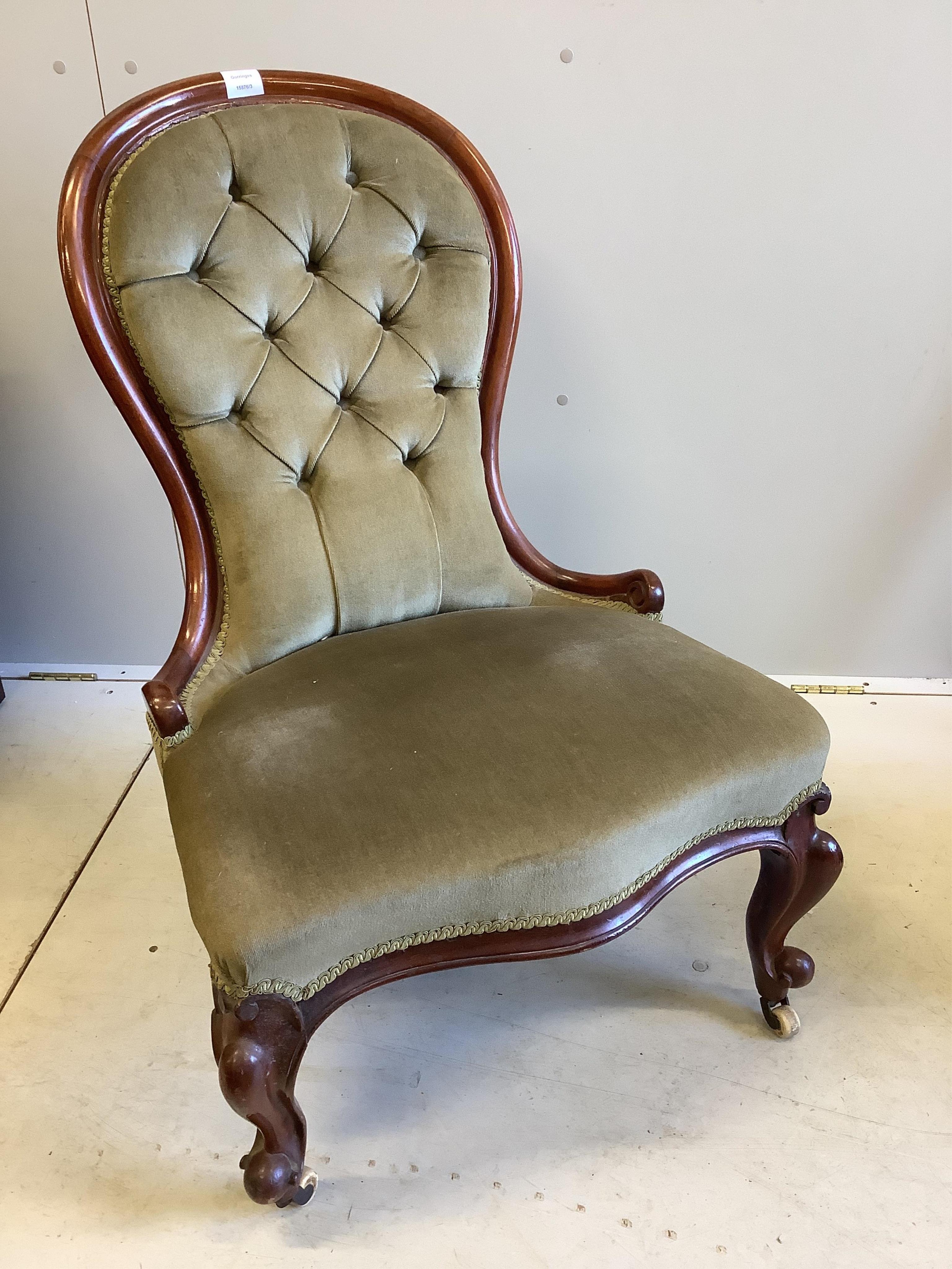 A Victorian mahogany spoon back nursing chair, width 60cm, depth 48cm, height 90cm. Condition - good